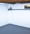 Santa Barbara, CA wet basement wall covering that tucks into a perimeter drainage system