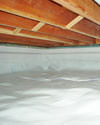 a moisture barrier installed on the walls and floors of a crawl space in Port Hueneme