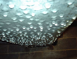 a flooded basement floor in a Ojai home