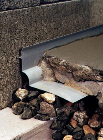 below foundation slab drain system for installing a French drain in 
