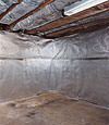 An energy efficient radiant heat and vapor barrier for a  basement finishing project